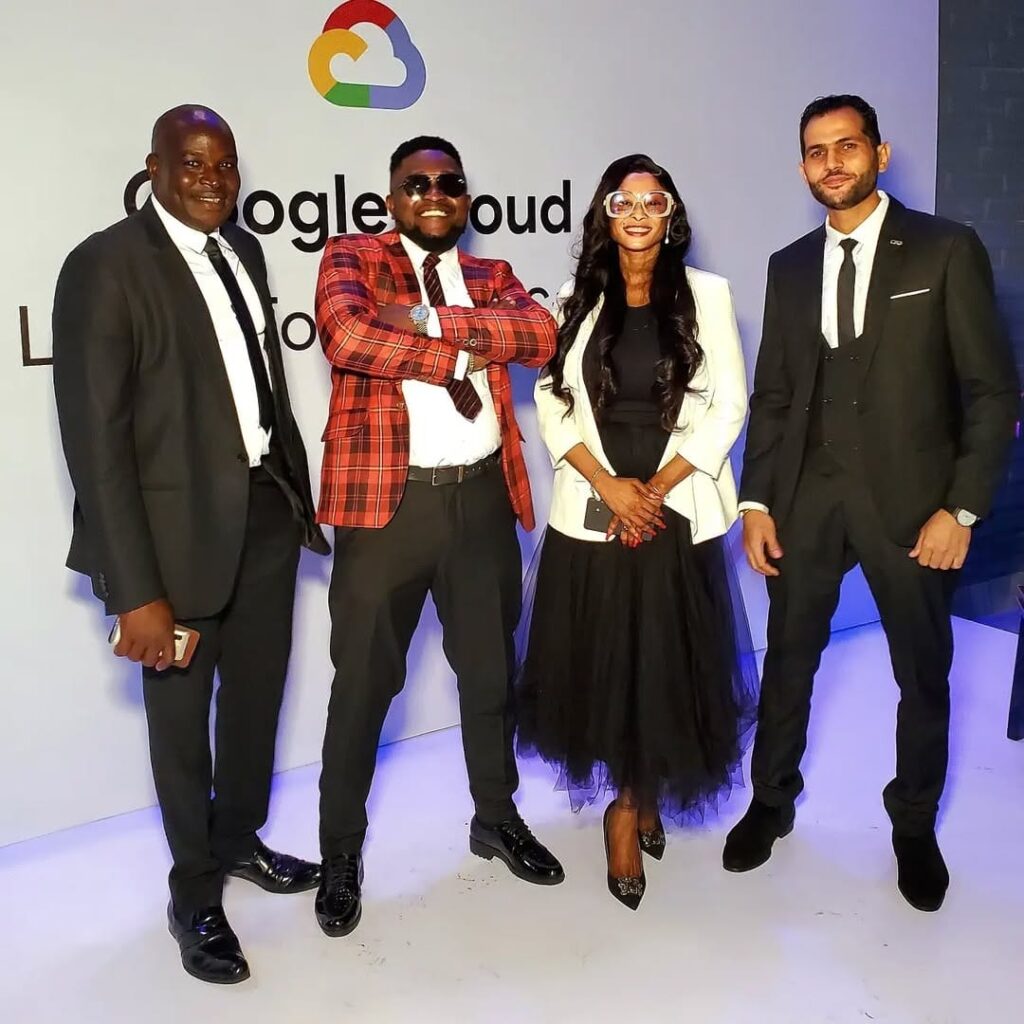 Drtonez alongside other entertainment executives at a networking and social event.